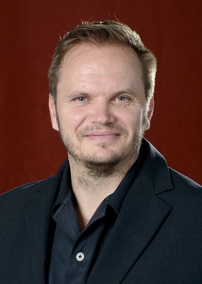 A headshot of Janos Katter
