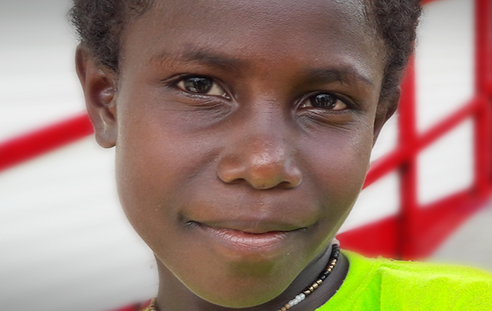 A child from Papua New Guinea smiling