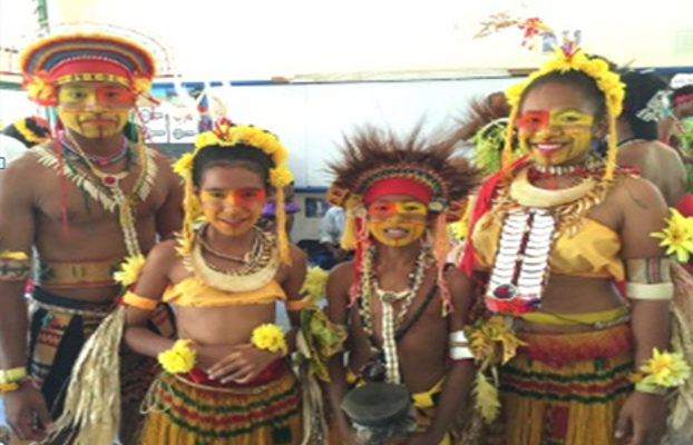 A group of Papau New Guinean Children in traditional dress